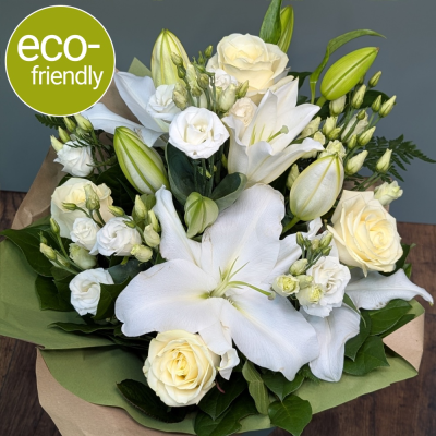 Elegant White Rose & Lily Bouquet | Expertly crafted at The Floral Box - Send a message of pure elegance with our White Rose & Lily bouquet. Pristine white roses and fragrant lilies, expertly hand-tied and beautifully boxed. Perfect for any occasion.